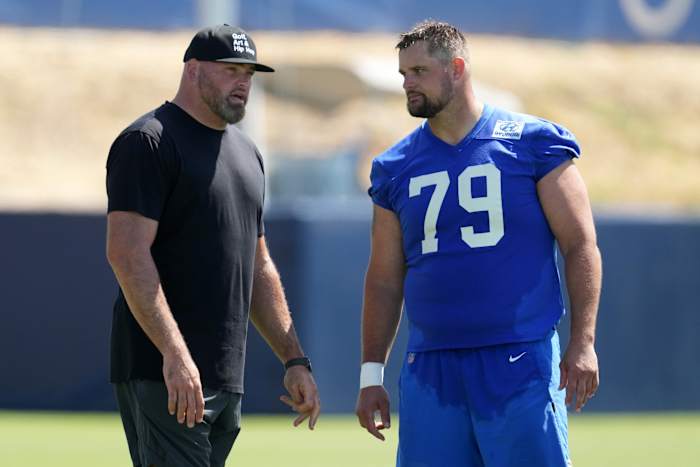 Andrew Whitworth (left) talks with Los Angeles Rams tackle Rob Havenstein (79) during minicamp at Cal Lutheran University.
